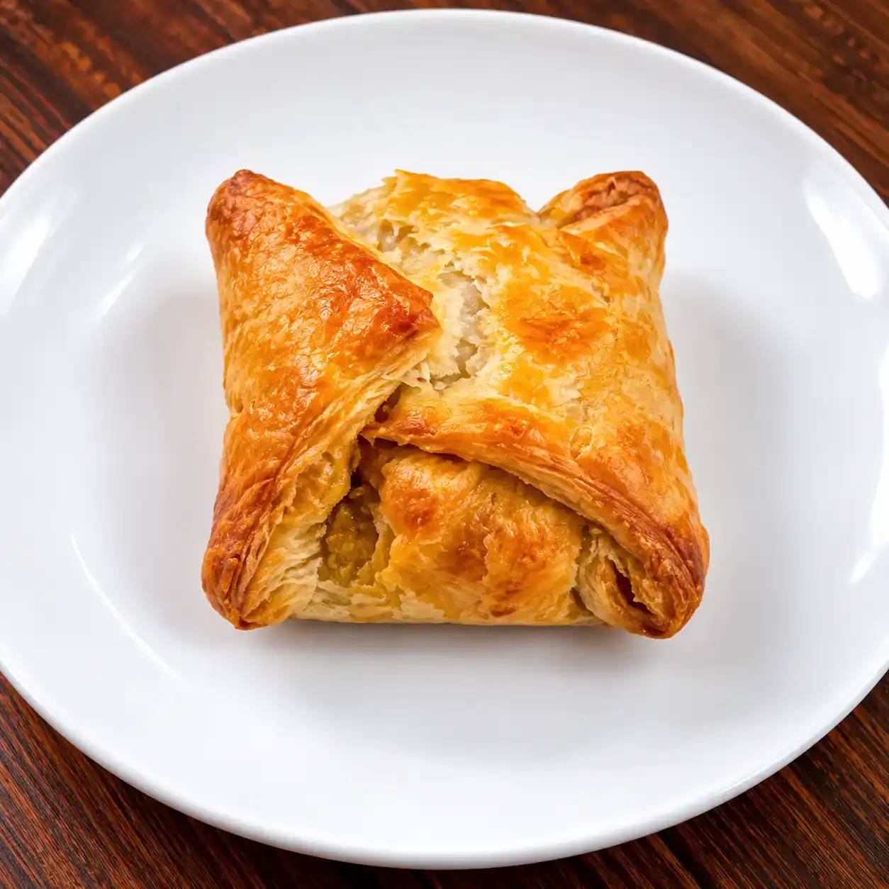 Chana Puff — Golden, crispy puffs encapsulate a warm, fragrant filling of perfectly at Apna Bazar - Eatery